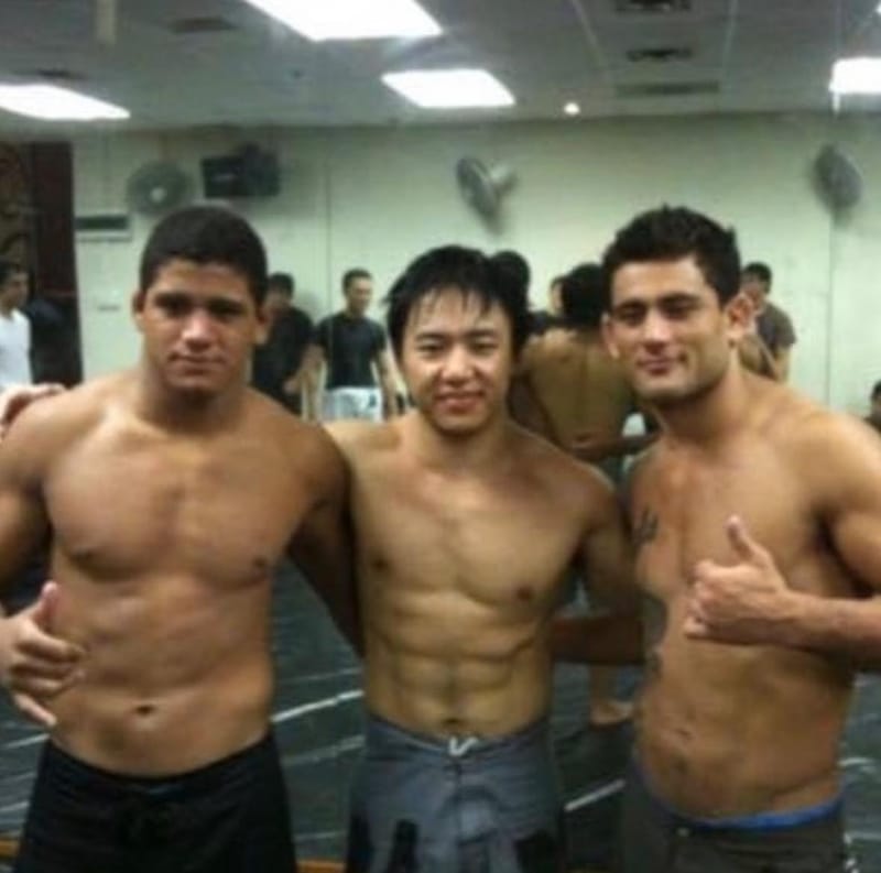 Jason Quek, centre, with two training partners at the academy about fifteen years ago